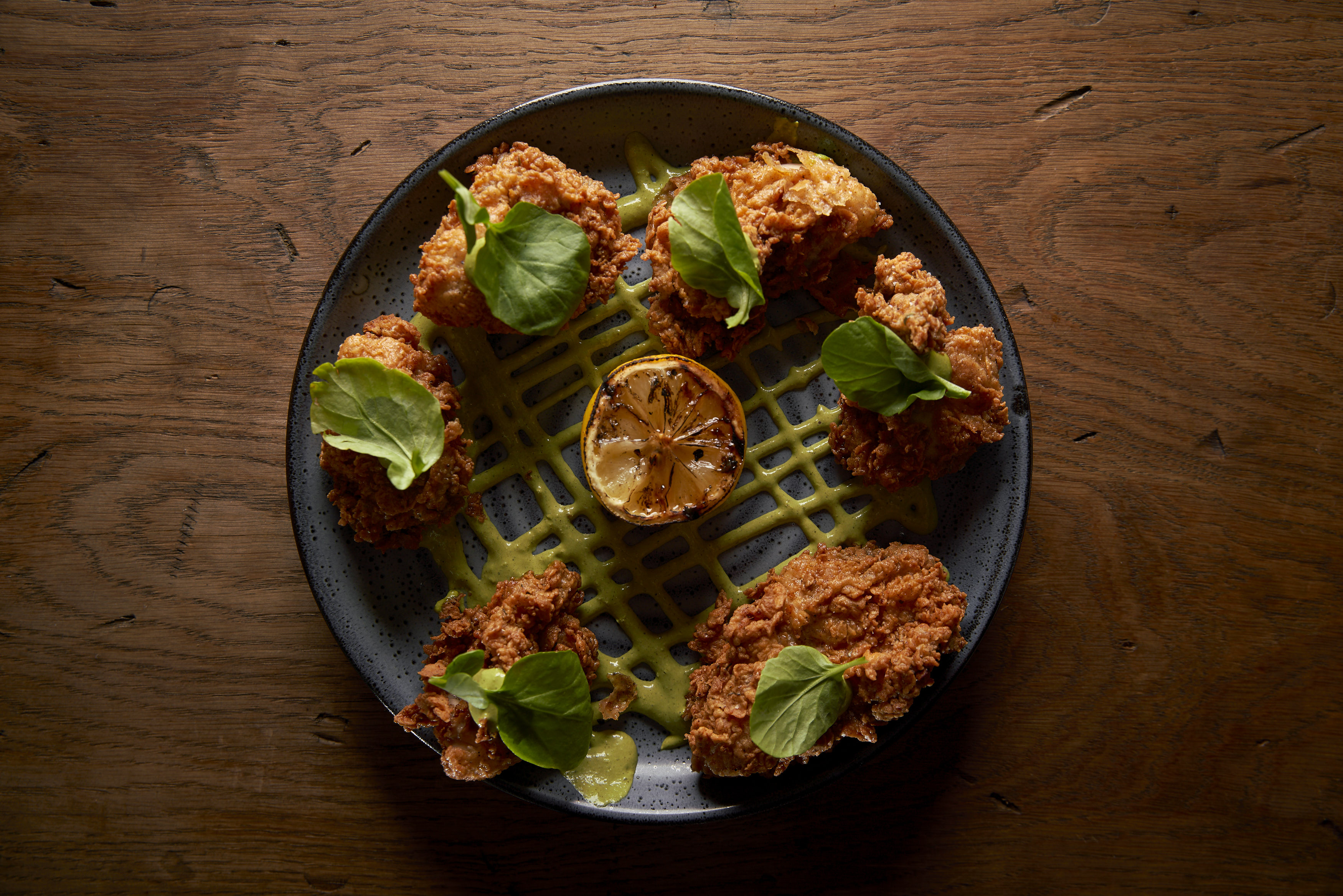 Crispy fried oysters from Ember Miami at the Miami Design District