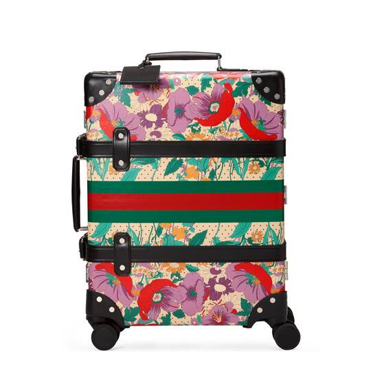 Gucci Globetrotter luggage in floral print