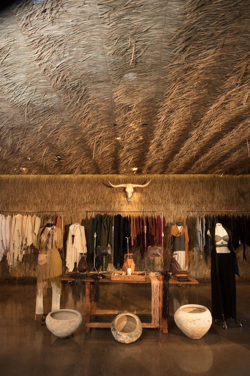 interior shot of Caravana thatched roof and clothing